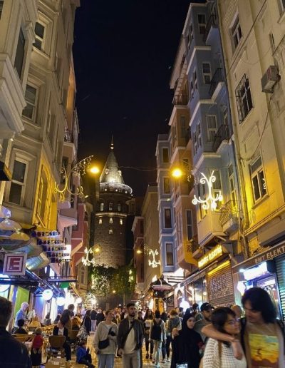 First-Time Visit to Istanbul - crowds at night by the Galata Tower